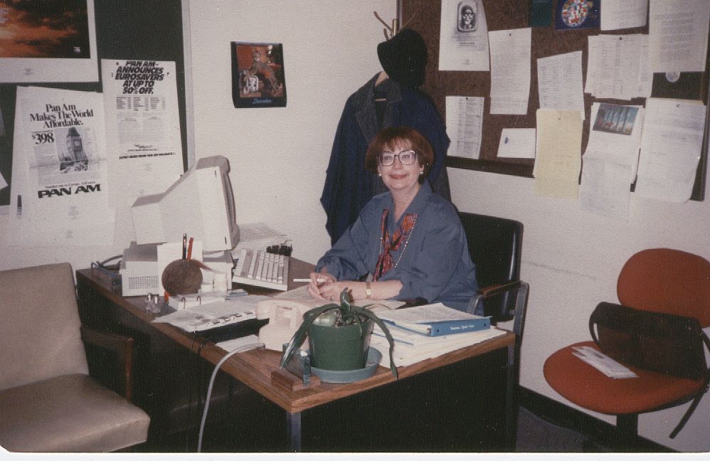 1989, Reservations Supervisor, Helen Harkens, at her desk in the Pan Am Building.  It was Helen's job to ensure all reservations staff were aware of the many different promotions the company initiatied to attract customers.